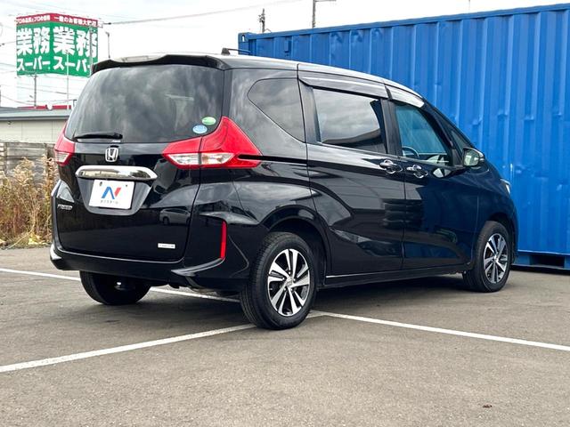 フリード Ｇ・ホンダセンシング　４ＷＤ　禁煙車　両側電動ドア　後席モニター　純正ＳＤナビ　バックカメラ　衝突被害軽減システム　レーダークルーズ　ハーフレザーシート　コーナーセンサー　スマートキー　ＬＥＤヘッド　ビルトインＥＴＣ（18枚目）