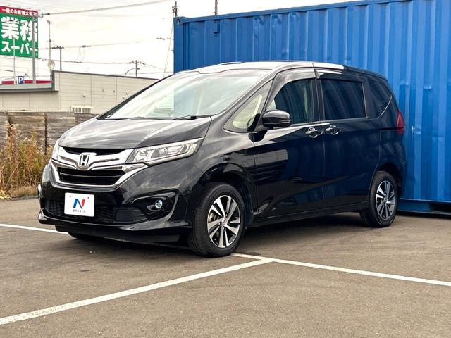 フリード Ｇ・ホンダセンシング　４ＷＤ　禁煙車　両側電動ドア　後席モニター　純正ＳＤナビ　バックカメラ　衝突被害軽減システム　レーダークルーズ　ハーフレザーシート　コーナーセンサー　スマートキー　ＬＥＤヘッド　ビルトインＥＴＣ（43枚目）