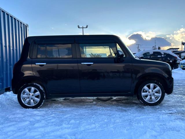 アルトラパン Xセレクション 4WD 純正オーディオ 禁煙車 HIDヘッドライト スマートキー シートヒーター オートエアコン 純正14インチAW 電動格納ミラー ドアバイザー 盗難防止システム(27枚目)