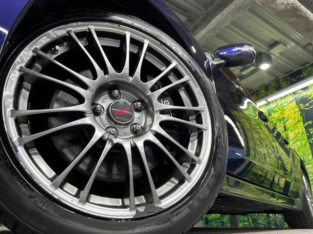 インプレッサ ＷＲＸ　ＳＴＩ　Ａライン　４ＷＤ　ターボ　サンルーフ　純正ＳＤナビ　バックカメラ　寒冷地仕様　シートヒーター　パワーシート　ＨＩＤ　ＥＴＣ　クルーズコントロール　オートエアコン　純正１８インチアルミ　Ｂｌｕｅｔｏｏｔｈ（14枚目）