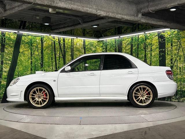 インプレッサ ＷＲＸ　鷹目インプレッサ　後期Ｇ型　４ＷＤ　シングルスクロールターボ　ナビ　ＨＩＤヘッド　ＥＴＣ　サイドシルスポイラー　オートエアコン　１７インチアルミホイール　ＣＤ（33枚目）