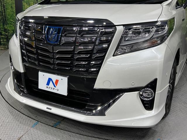 アルファードハイブリッド Ｇ　Ｆパッケージ　４ＷＤ　本州仕入　禁煙車　フルエアロ　ＪＢＬサウンド　両側電動ドア　純正９型ナビ　後席モニター　バックカメラ　１００Ｖ電源　衝突被害軽減システム　レーダークルーズ　メモリー付パワーシート　置くだけ充電（3枚目）