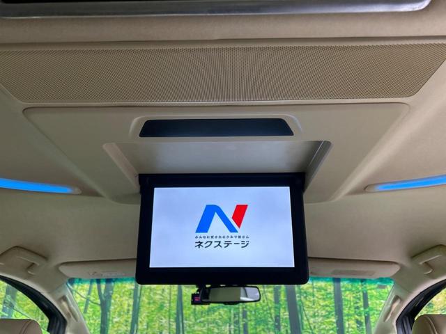 アルファードハイブリッド Ｇ　Ｆパッケージ　４ＷＤ　本州仕入　禁煙車　フルエアロ　ＪＢＬサウンド　両側電動ドア　純正９型ナビ　後席モニター　バックカメラ　１００Ｖ電源　衝突被害軽減システム　レーダークルーズ　メモリー付パワーシート　置くだけ充電（4枚目）