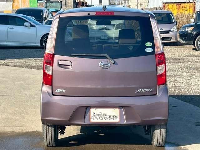 ムーヴ Ｌ　車検整備付　ベンチシート　エコアイドル　キーレス　４ＷＤ　純正オーディオ　寒冷地仕様　フルフラット　シルキーマルーンメタリック（8枚目）