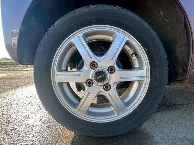 ムーヴ Ｌ　車検整備付　ベンチシート　エコアイドル　キーレス　４ＷＤ　純正オーディオ　寒冷地仕様　フルフラット　シルキーマルーンメタリック（23枚目）