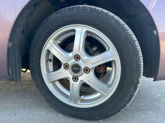 ムーヴ Ｌ　車検整備付　ベンチシート　エコアイドル　キーレス　４ＷＤ　純正オーディオ　寒冷地仕様　フルフラット　シルキーマルーンメタリック（26枚目）