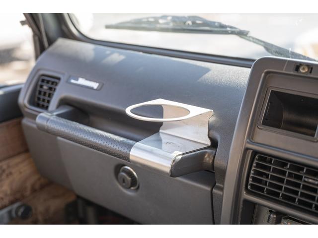 ジムニー ＨＣ　／リッチモンドグリーン／２インチリフトアップ／アクセレラマッドタイヤ／純正スチールマッドブラックペイント／クラシックグリル／室内ウッドデカール／ＬＥＤヘッドライト／ステンレス社外マフラー／（26枚目）