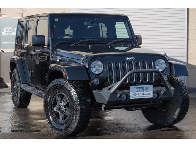 ジープ・ラングラーアンリミテッド サハラ /本州西日本仕入れ/ジオランダーX-ATタイヤ/ロックガンアルミホイール/インサートグリル/クロカンスチールバンパー/LEDヘッドライト/サイドカメラ/Bluetoothナビ/バックカメラ/後期モデル(3枚目)