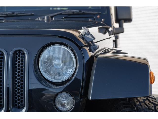 ジープ・ラングラーアンリミテッド サハラ /本州西日本仕入れ/ジオランダーX-ATタイヤ/ロックガンアルミホイール/インサートグリル/クロカンスチールバンパー/LEDヘッドライト/サイドカメラ/Bluetoothナビ/バックカメラ/後期モデル(9枚目)