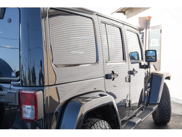 ジープ・ラングラーアンリミテッド サハラ /本州西日本仕入れ/ジオランダーX-ATタイヤ/ロックガンアルミホイール/インサートグリル/クロカンスチールバンパー/LEDヘッドライト/サイドカメラ/Bluetoothナビ/バックカメラ/後期モデル(14枚目)