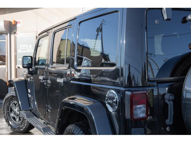 ジープ・ラングラーアンリミテッド サハラ /本州西日本仕入れ/ジオランダーX-ATタイヤ/ロックガンアルミホイール/インサートグリル/クロカンスチールバンパー/LEDヘッドライト/サイドカメラ/Bluetoothナビ/バックカメラ/後期モデル(16枚目)