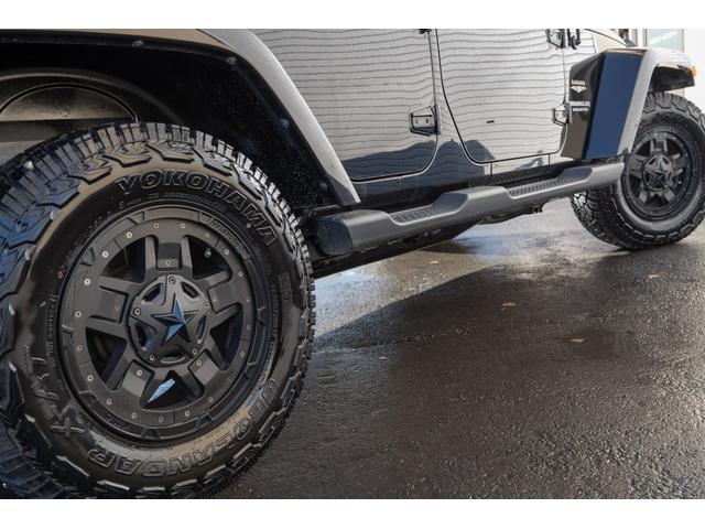 ジープ・ラングラーアンリミテッド サハラ /本州西日本仕入れ/ジオランダーX-ATタイヤ/ロックガンアルミホイール/インサートグリル/クロカンスチールバンパー/LEDヘッドライト/サイドカメラ/Bluetoothナビ/バックカメラ/後期モデル(17枚目)