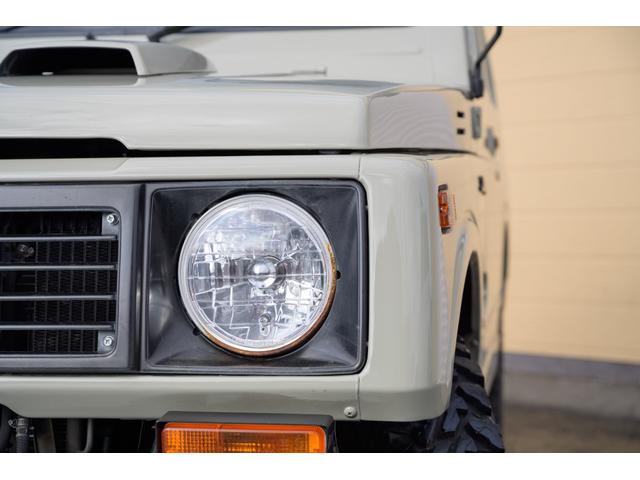 ジムニー 　／オールペイントデザートカーキ／２インチアップ／最終５型モデル／クラシックグリル／ジオランダーマッドタイヤ／前後ステンレスバンパー／クリスタルヘッドライト／ドライブレコーダー／シートカバー／エアコン／（10枚目）