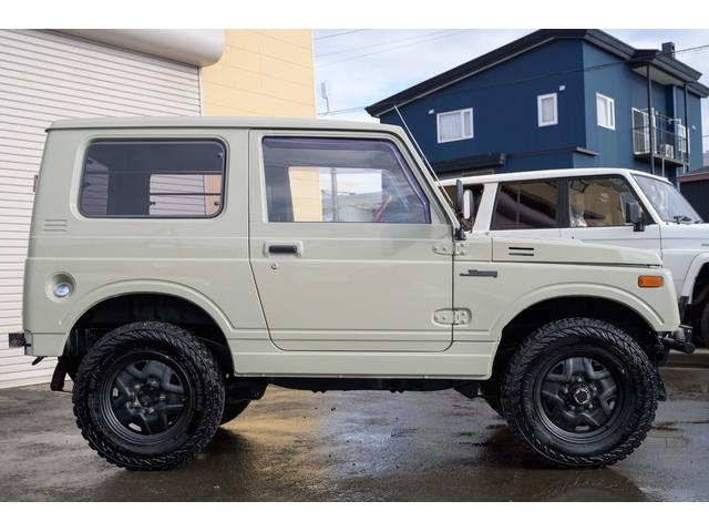 ジムニー 　／オールペイントデザートカーキ／２インチアップ／最終５型モデル／クラシックグリル／ジオランダーマッドタイヤ／前後ステンレスバンパー／クリスタルヘッドライト／ドライブレコーダー／シートカバー／エアコン／（14枚目）