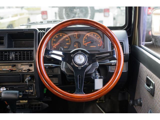 ジムニー 　／オールペイントデザートカーキ／２インチアップ／最終５型モデル／クラシックグリル／ジオランダーマッドタイヤ／前後ステンレスバンパー／クリスタルヘッドライト／ドライブレコーダー／シートカバー／エアコン／（25枚目）