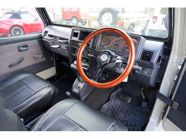 ジムニー 　／オールペイントデザートカーキ／２インチアップ／最終５型モデル／クラシックグリル／ジオランダーマッドタイヤ／前後ステンレスバンパー／クリスタルヘッドライト／ドライブレコーダー／シートカバー／エアコン／（35枚目）