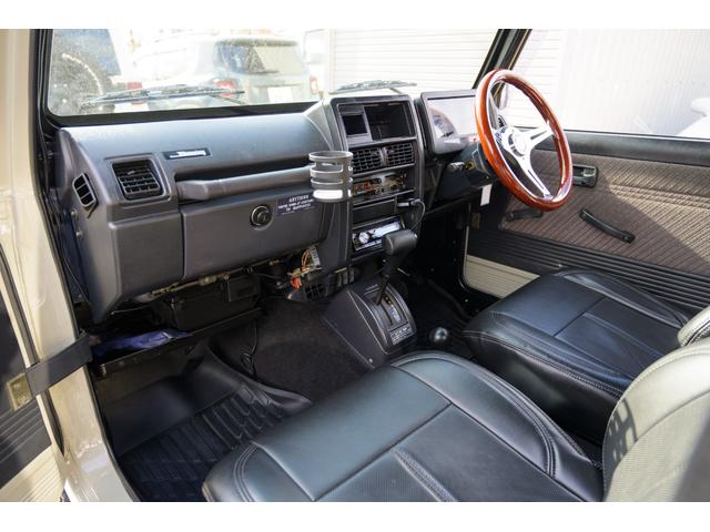 ジムニー 　／オールペイントデザートカーキ／２インチアップ／最終５型モデル／クラシックグリル／ジオランダーマッドタイヤ／前後ステンレスバンパー／クリスタルヘッドライト／ドライブレコーダー／シートカバー／エアコン／（38枚目）