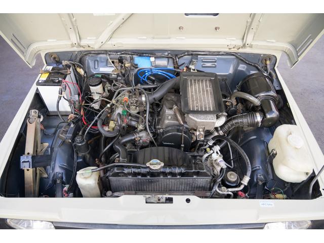 ジムニー 　／オールペイントデザートカーキ／２インチアップ／最終５型モデル／クラシックグリル／ジオランダーマッドタイヤ／前後ステンレスバンパー／クリスタルヘッドライト／ドライブレコーダー／シートカバー／エアコン／（46枚目）