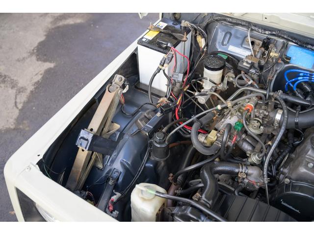 ジムニー 　／オールペイントデザートカーキ／２インチアップ／最終５型モデル／クラシックグリル／ジオランダーマッドタイヤ／前後ステンレスバンパー／クリスタルヘッドライト／ドライブレコーダー／シートカバー／エアコン／（47枚目）