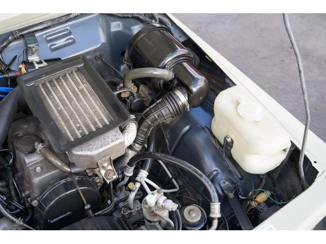 ジムニー 　／オールペイントデザートカーキ／２インチアップ／最終５型モデル／クラシックグリル／ジオランダーマッドタイヤ／前後ステンレスバンパー／クリスタルヘッドライト／ドライブレコーダー／シートカバー／エアコン／（48枚目）