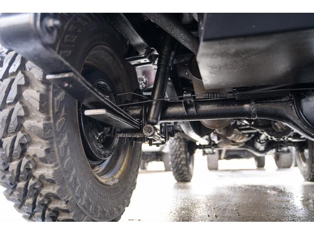 ジムニー 　／オールペイントデザートカーキ／２インチアップ／最終５型モデル／クラシックグリル／ジオランダーマッドタイヤ／前後ステンレスバンパー／クリスタルヘッドライト／ドライブレコーダー／シートカバー／エアコン／（57枚目）