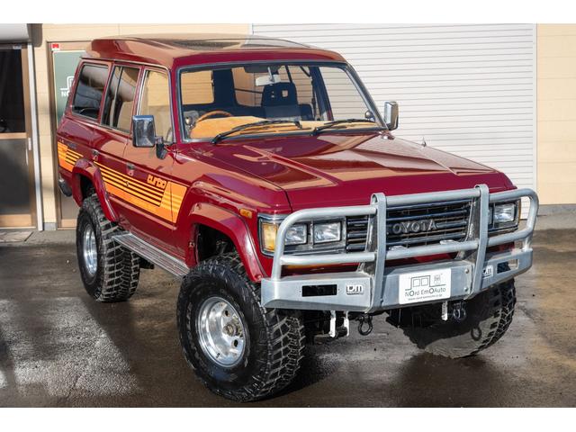 ランドクルーザー60 VX /本州北関東仕入れ/4インチリフトアップ/USリアバンパー/サイドデカール/グッドイヤーMTRマッドタイヤ/レンコンホイール/新品デポレーシングステアリング/キッカースピーカー/ワインレッドペイント/(3枚目)