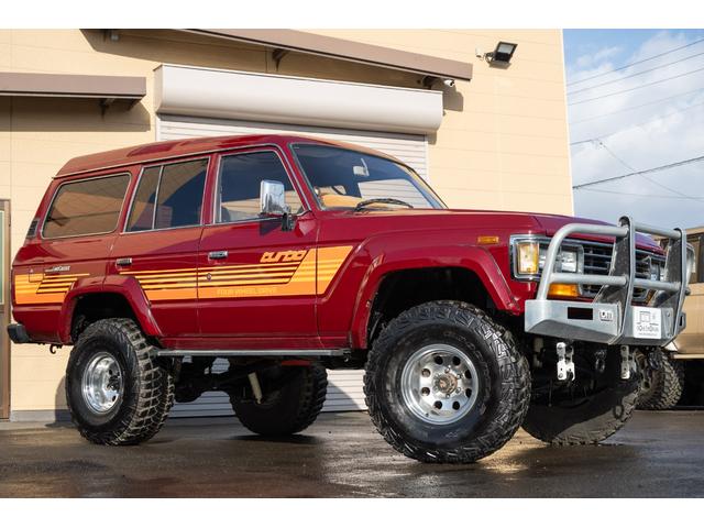 ランドクルーザー60 VX /本州北関東仕入れ/4インチリフトアップ/USリアバンパー/サイドデカール/グッドイヤーMTRマッドタイヤ/レンコンホイール/新品デポレーシングステアリング/キッカースピーカー/ワインレッドペイント/(7枚目)