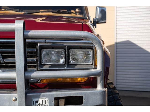 ランドクルーザー60 VX /本州北関東仕入れ/4インチリフトアップ/USリアバンパー/サイドデカール/グッドイヤーMTRマッドタイヤ/レンコンホイール/新品デポレーシングステアリング/キッカースピーカー/ワインレッドペイント/(10枚目)