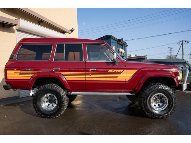 ランドクルーザー60 VX /本州北関東仕入れ/4インチリフトアップ/USリアバンパー/サイドデカール/グッドイヤーMTRマッドタイヤ/レンコンホイール/新品デポレーシングステアリング/キッカースピーカー/ワインレッドペイント/(14枚目)