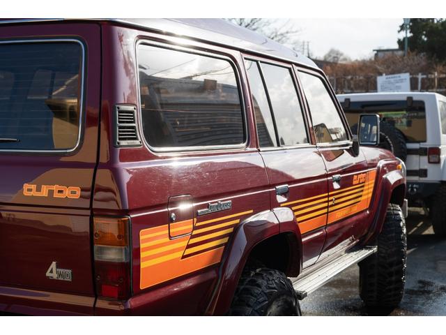 ランドクルーザー60 VX /本州北関東仕入れ/4インチリフトアップ/USリアバンパー/サイドデカール/グッドイヤーMTRマッドタイヤ/レンコンホイール/新品デポレーシングステアリング/キッカースピーカー/ワインレッドペイント/(15枚目)