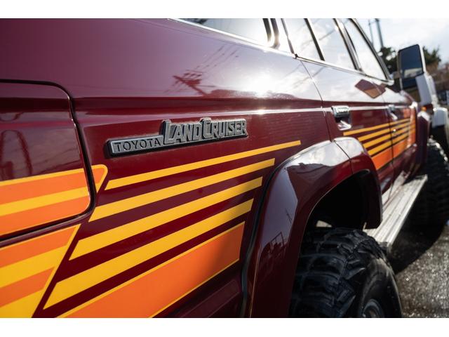 ランドクルーザー60 VX /本州北関東仕入れ/4インチリフトアップ/USリアバンパー/サイドデカール/グッドイヤーMTRマッドタイヤ/レンコンホイール/新品デポレーシングステアリング/キッカースピーカー/ワインレッドペイント/(16枚目)