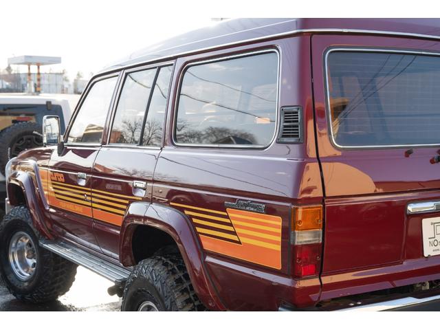 ランドクルーザー60 VX /本州北関東仕入れ/4インチリフトアップ/USリアバンパー/サイドデカール/グッドイヤーMTRマッドタイヤ/レンコンホイール/新品デポレーシングステアリング/キッカースピーカー/ワインレッドペイント/(17枚目)