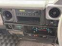 ＬＸ　／本州西日本仕入れ／オールペイントブラック／後期型７６／フロントコイルサスペンション／電圧１２Ｖ／純正ナローボデイ／４ナンバー登録／ブラッドレーアルミホイール／グッドリッヂＫＯ２オールテレーンタイヤ／（27枚目）
