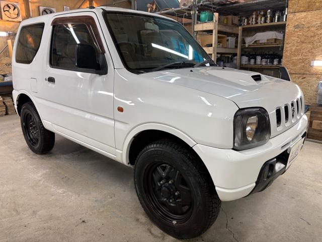ジムニー XG 4WD/本州産/3型/5MT/ナビ/TV/下防錆済/ABS/ETC/キーレス/スタットレスタイヤ装着/純正ゴムマット/ドアバイザー/背面タイヤカバー/ライトコーティング/エアコン//検2年/(3枚目)