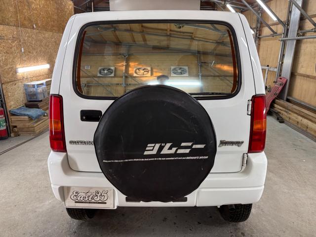 ジムニー XG 4WD/本州産/3型/5MT/ナビ/TV/下防錆済/ABS/ETC/キーレス/スタットレスタイヤ装着/純正ゴムマット/ドアバイザー/背面タイヤカバー/ライトコーティング/エアコン//検2年/(5枚目)