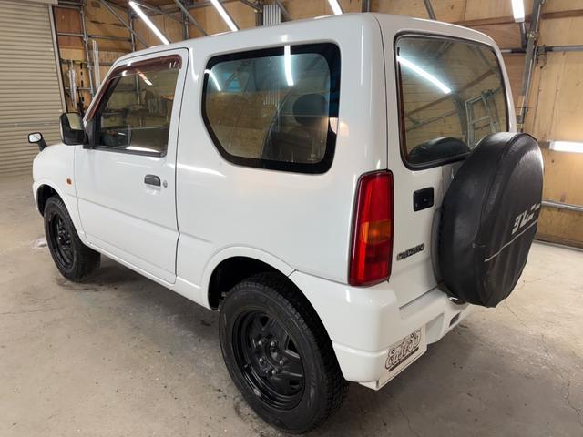 ジムニー XG 4WD/本州産/3型/5MT/ナビ/TV/下防錆済/ABS/ETC/キーレス/スタットレスタイヤ装着/純正ゴムマット/ドアバイザー/背面タイヤカバー/ライトコーティング/エアコン//検2年/(6枚目)