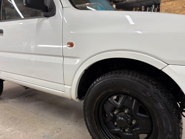ジムニー XG 4WD/本州産/3型/5MT/ナビ/TV/下防錆済/ABS/ETC/キーレス/スタットレスタイヤ装着/純正ゴムマット/ドアバイザー/背面タイヤカバー/ライトコーティング/エアコン//検2年/(10枚目)