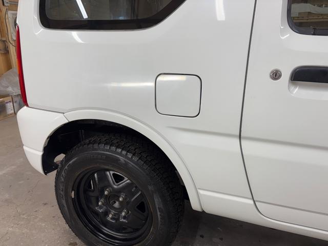 ジムニー XG 4WD/本州産/3型/5MT/ナビ/TV/下防錆済/ABS/ETC/キーレス/スタットレスタイヤ装着/純正ゴムマット/ドアバイザー/背面タイヤカバー/ライトコーティング/エアコン//検2年/(11枚目)