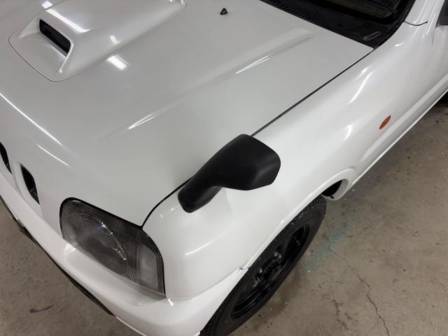 ジムニー XG 4WD/本州産/3型/5MT/ナビ/TV/下防錆済/ABS/ETC/キーレス/スタットレスタイヤ装着/純正ゴムマット/ドアバイザー/背面タイヤカバー/ライトコーティング/エアコン//検2年/(14枚目)