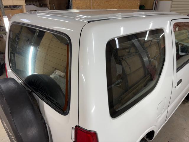 ジムニー XG 4WD/本州産/3型/5MT/ナビ/TV/下防錆済/ABS/ETC/キーレス/スタットレスタイヤ装着/純正ゴムマット/ドアバイザー/背面タイヤカバー/ライトコーティング/エアコン//検2年/(20枚目)