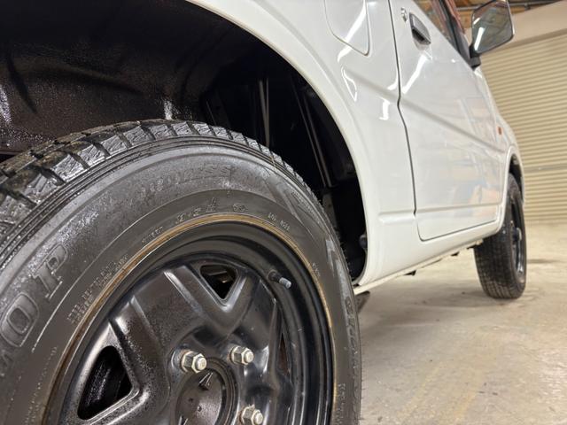 ジムニー XG 4WD/本州産/3型/5MT/ナビ/TV/下防錆済/ABS/ETC/キーレス/スタットレスタイヤ装着/純正ゴムマット/ドアバイザー/背面タイヤカバー/ライトコーティング/エアコン//検2年/(22枚目)