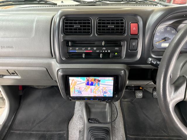 ジムニー XG 4WD/本州産/3型/5MT/ナビ/TV/下防錆済/ABS/ETC/キーレス/スタットレスタイヤ装着/純正ゴムマット/ドアバイザー/背面タイヤカバー/ライトコーティング/エアコン//検2年/(34枚目)