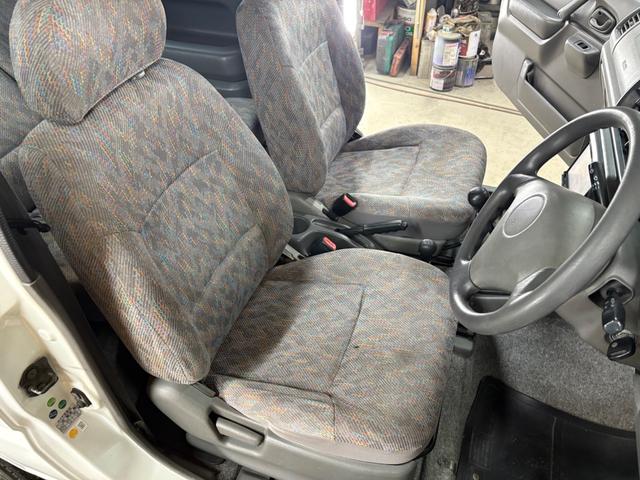 ジムニー XG 4WD/本州産/3型/5MT/ナビ/TV/下防錆済/ABS/ETC/キーレス/スタットレスタイヤ装着/純正ゴムマット/ドアバイザー/背面タイヤカバー/ライトコーティング/エアコン//検2年/(42枚目)