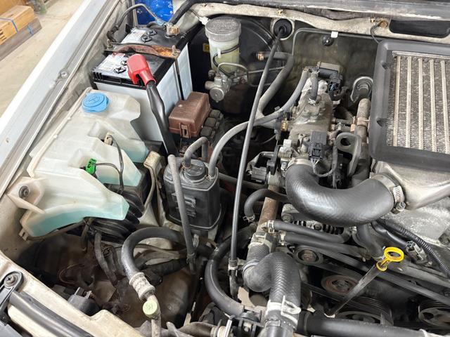 ジムニー XG 4WD/本州産/3型/5MT/ナビ/TV/下防錆済/ABS/ETC/キーレス/スタットレスタイヤ装着/純正ゴムマット/ドアバイザー/背面タイヤカバー/ライトコーティング/エアコン//検2年/(59枚目)