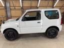 ジムニー XG 4WD/本州産/3型/5MT/ナビ/TV/下防錆済/ABS/ETC/キーレス/スタットレスタイヤ装着/純正ゴムマット/ドアバイザー/背面タイヤカバー/ライトコーティング/エアコン//検2年/(7枚目)