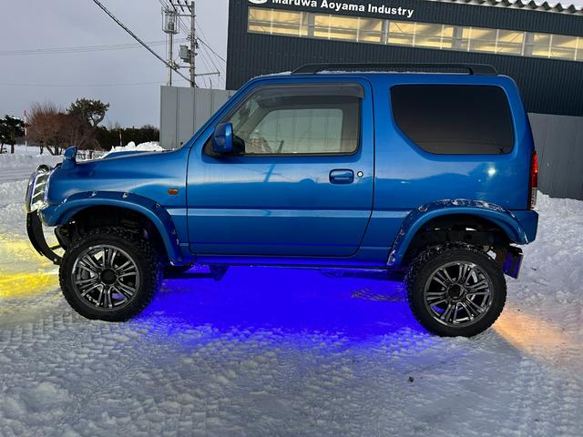 ジムニー ＸＣ　４ＷＤ　ナビ　キーレスエントリー　ＡＴ　ＡＢＳ　ＣＤ　ルーフレール　アルミホイール　衝突安全ボディ　エアコン　パワーウィンドウ　運転席エアバッグ　助手席エアバッグ（17枚目）