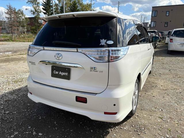 エスティマハイブリッド Ｘ　４ＷＤ　ＥＴＣ　バックカメラ　ナビ　ＴＶ　クリアランスソナー　オートクルーズコントロール　両側電動スライドドア　ＨＩＤ　スマートキー　電動格納ミラー　３列シート　ＣＶＴ　１００Ｖ電源　盗難防止システム（30枚目）