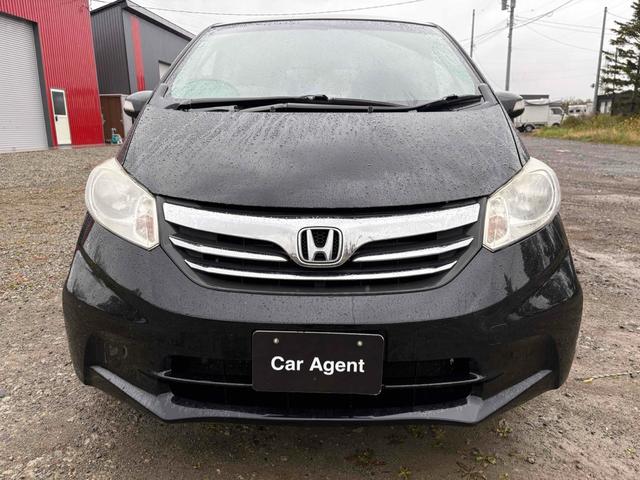 フリード G ジャストセレクション 4WD バックカメラ TV 両側スライド・片側電動 スマートキー 電動格納ミラー 3列シート AT アルミホイール 盗難防止システム 衝突安全ボディ ABS ESC エアコン パワーステアリング(12枚目)