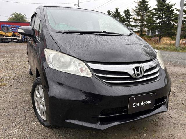 フリード G ジャストセレクション 4WD バックカメラ TV 両側スライド・片側電動 スマートキー 電動格納ミラー 3列シート AT アルミホイール 盗難防止システム 衝突安全ボディ ABS ESC エアコン パワーステアリング(13枚目)