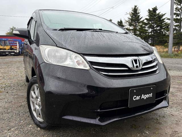 フリード G ジャストセレクション 4WD バックカメラ TV 両側スライド・片側電動 スマートキー 電動格納ミラー 3列シート AT アルミホイール 盗難防止システム 衝突安全ボディ ABS ESC エアコン パワーステアリング(23枚目)